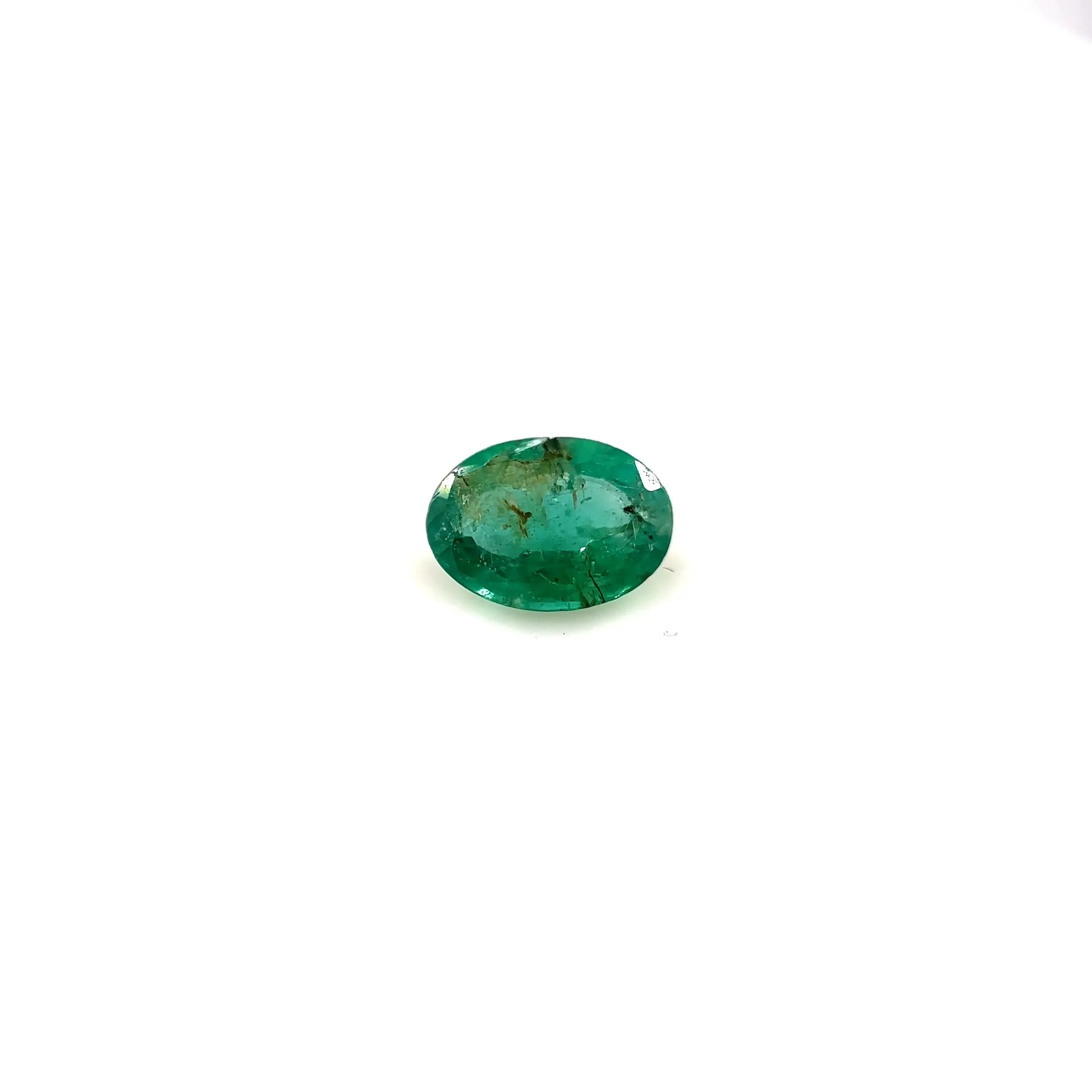 0.65ct Oval Natural Emerald (Colour Green, Clarity Slightly Included, Cut Faceted)