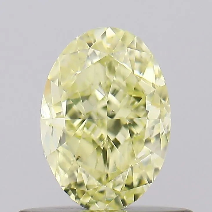 0.70ct Oval Natural Diamond (Colour Fancy Light Yellow, Clarity VS2, GIA Certified)