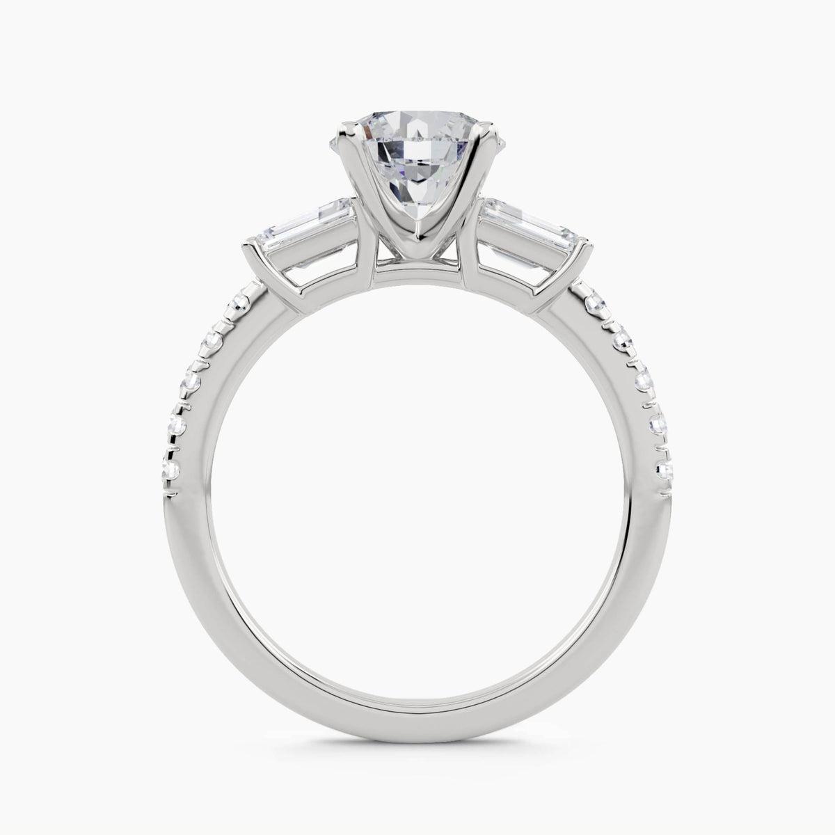 Three-Stone Ring with Emerald-Cut Side Stones and Pavé Shank, front view