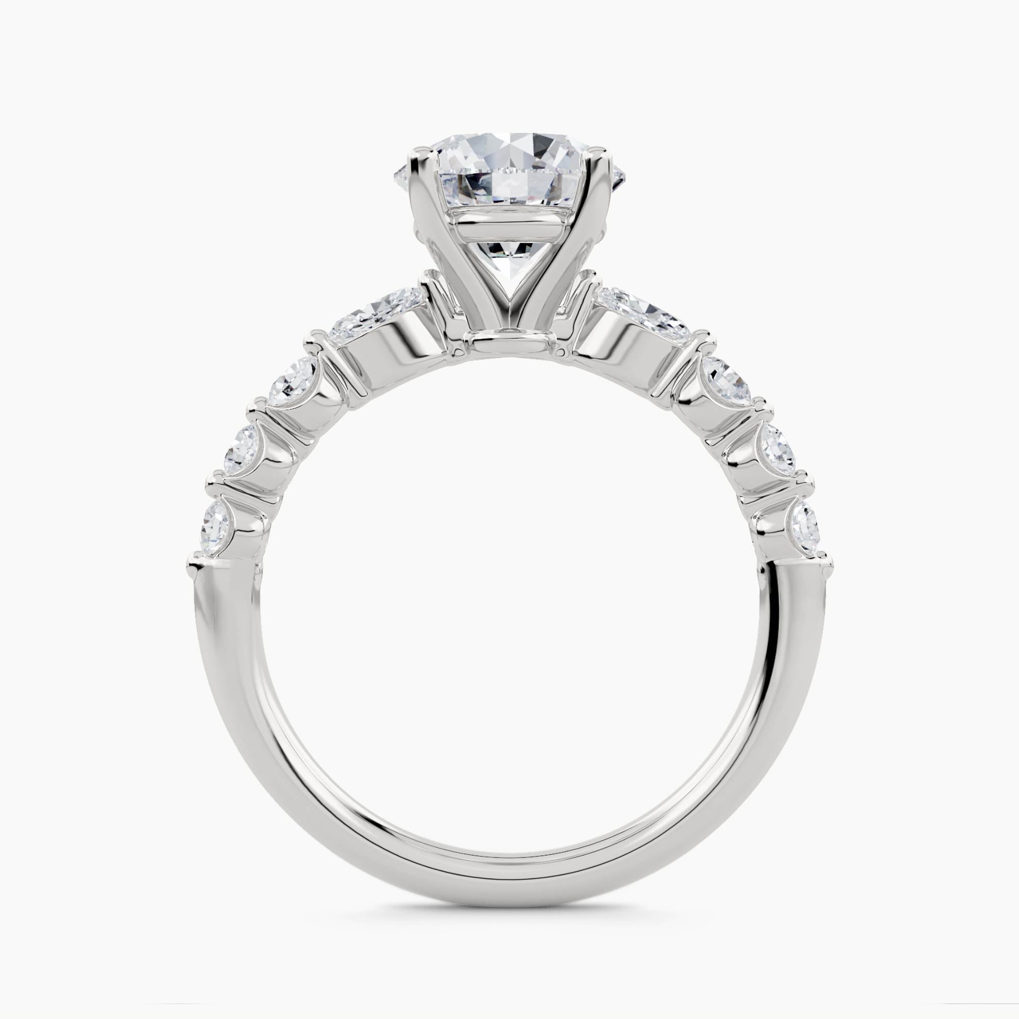 Solitaire Ring with Pear & Round Side Stones, front view