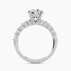 Solitaire Ring with Pear & Round Side Stones, front view