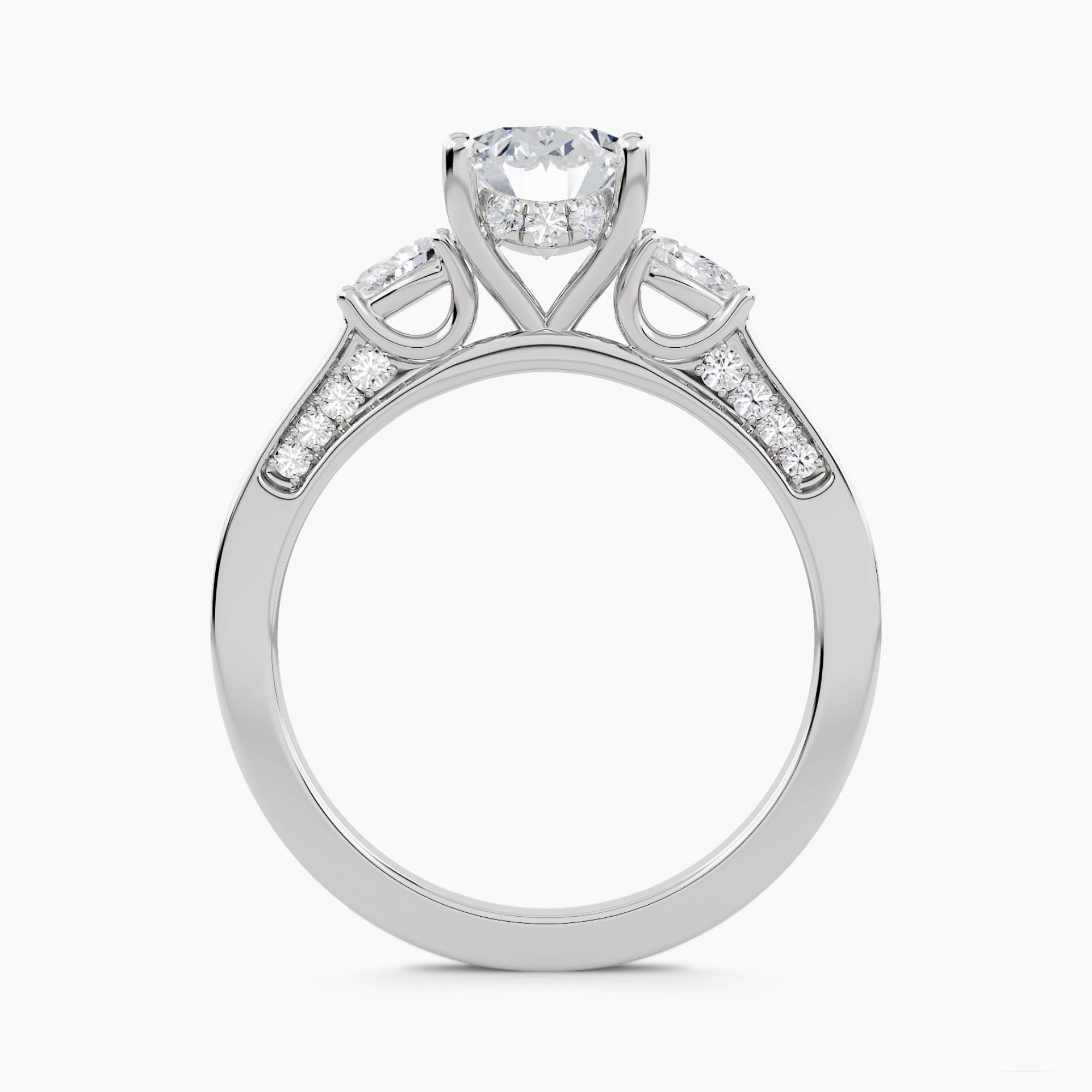 Three-Stone Ring with Pear Side Stones and Pavé Shoulders, front view