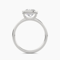 East-west solitaire engagement ring with thin European bezel setting and plain shank, front view