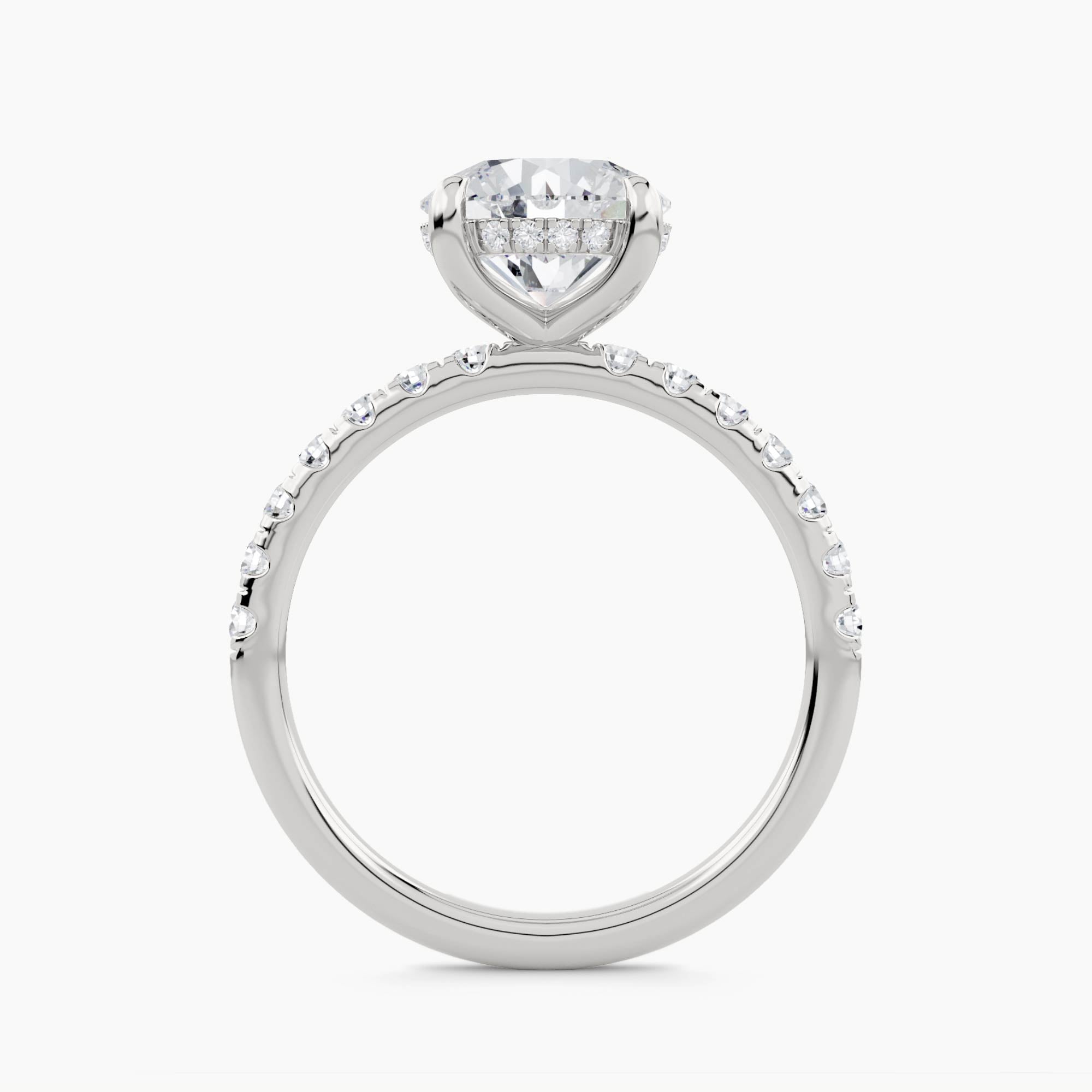 Solitaire engagement ring with hidden halo and pave set shank, front view
