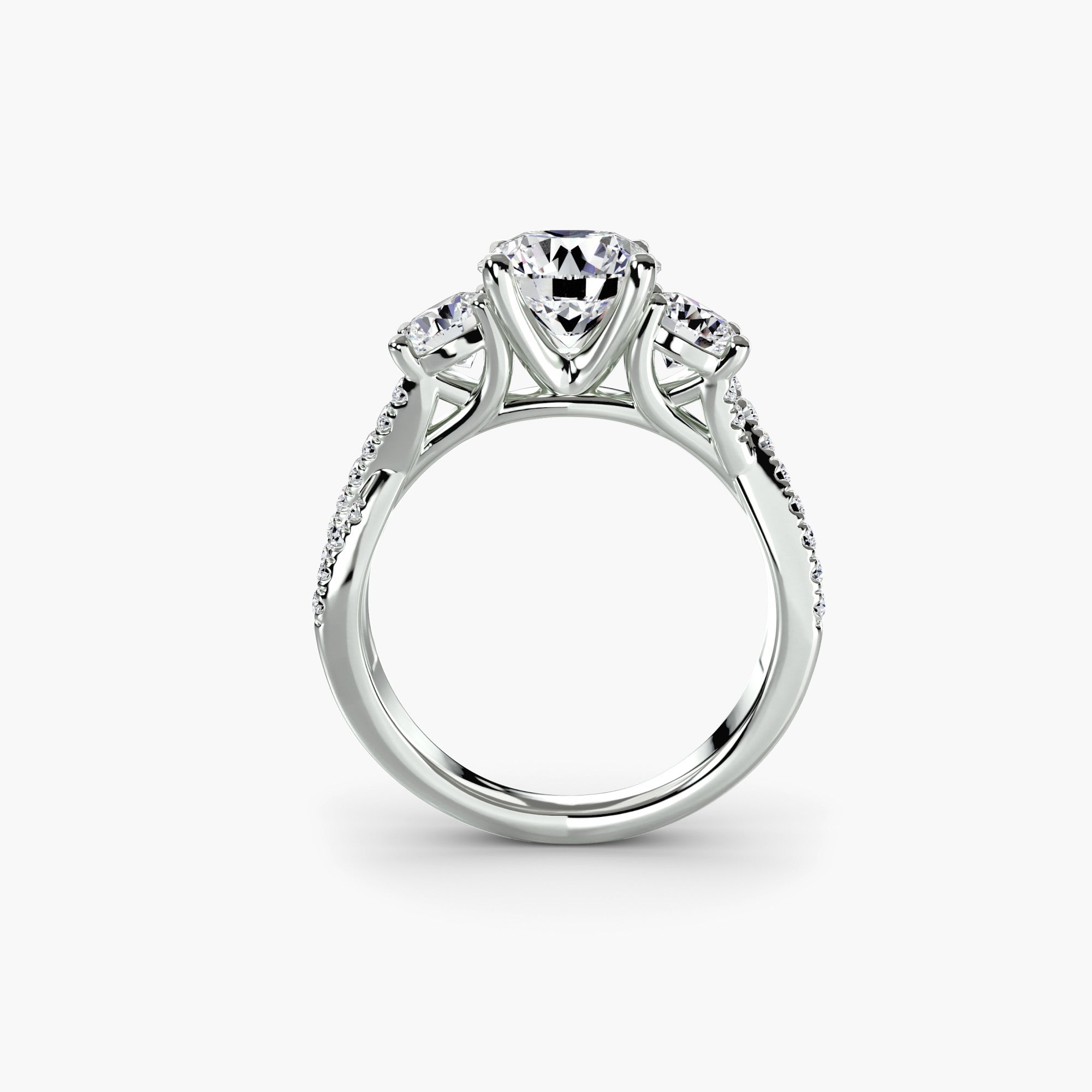 Three-Stone Ring with Round Side Stones and Crossover Pavé Shank, front view