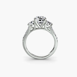 Three-Stone Ring with Round Side Stones and Wide Pavé Shoulders, front view