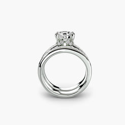 Solitaire Ring with Double Baguette Channel Bands, front view