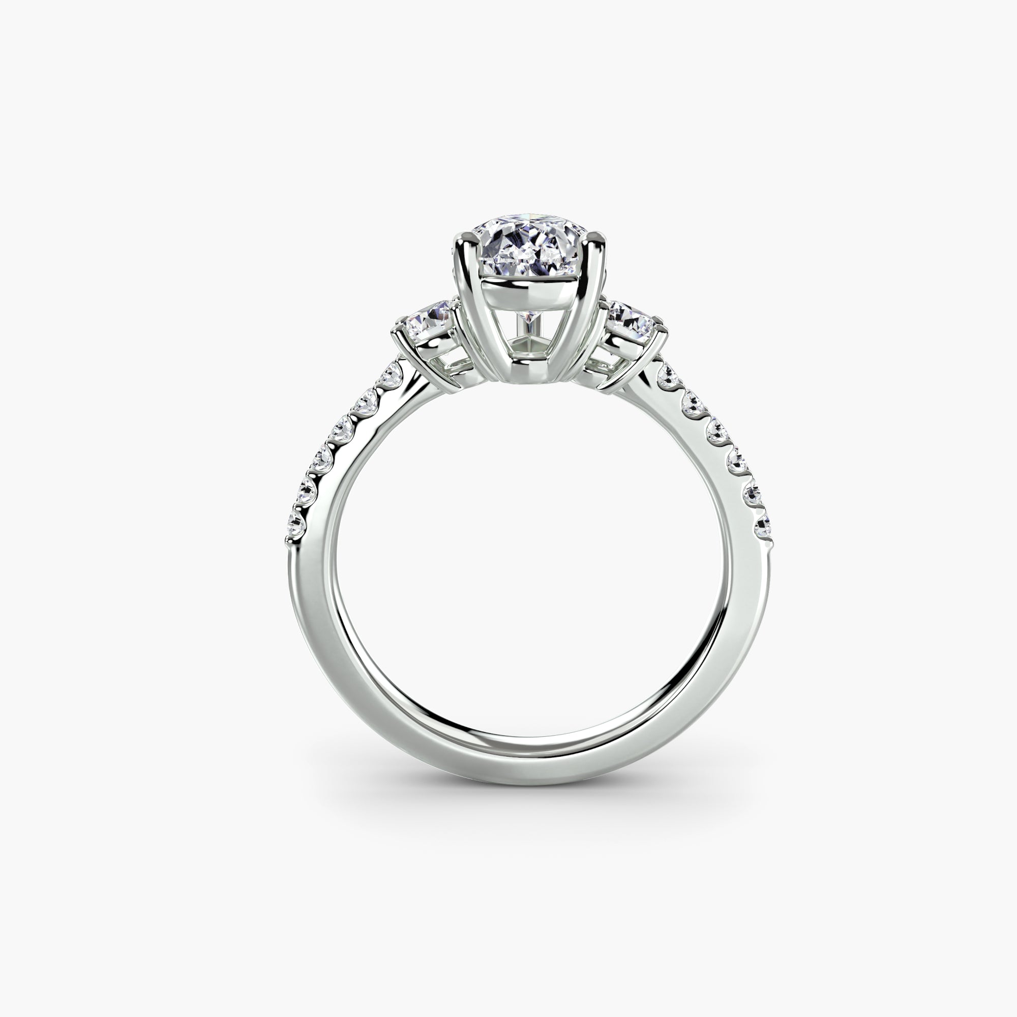 Three-Stone Ring with Round Side Stones and Pavé Shank, front view