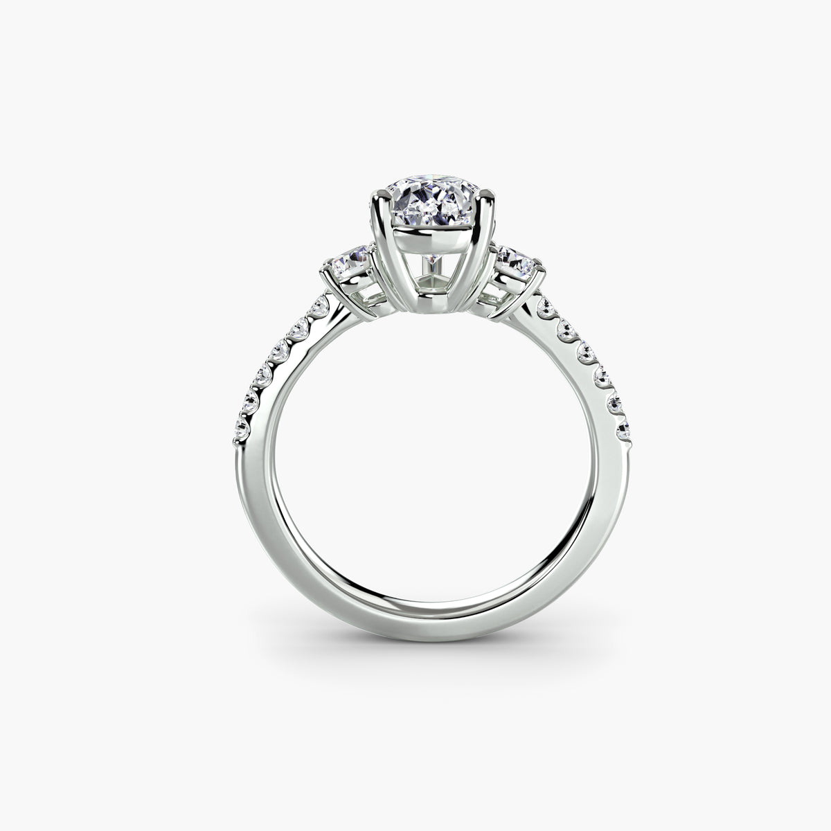 Three-Stone Ring with Round Side Stones and Pavé Shank, front view